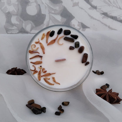 Vela aromática de soja natural y artesana, esencia de palo santo y minerales de ojo de tigre con azahar, protección y limpiar energías.