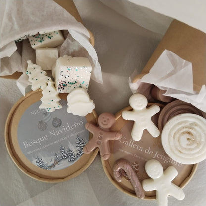 Pack dos wax melts de figuras navideñas con aroma a galleta de jengibre y bosque nevado. hechas a mano con cera de soja vegetal.